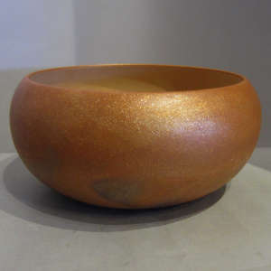 Fire clouds on a micaceous golden bowl