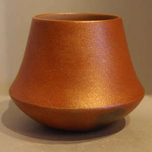 Orange micaceous jar