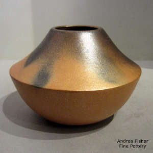 Fire clouds on a golden micaceous jar