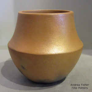 Fire clouds on a golden micaceous jar