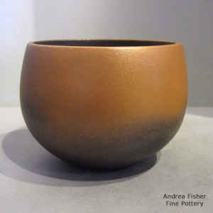 Golden micaceous bowl with fire clouds