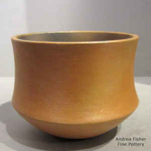 Golden micaceous jar with fire clouds