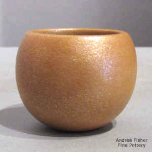 Miniature golden micaceous jar with fire clouds