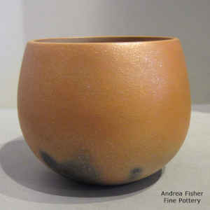 Golden micaceous jar with fire clouds