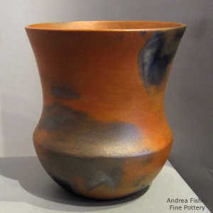 Fire clouds on a golden micaceous jar