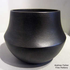 Fire clouds on a black micaceous jar