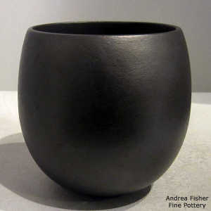 Fire clouds on a black micaceous jar