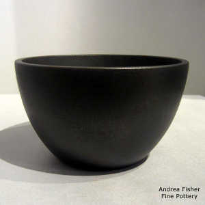 Fire clouds on a black micaceous bowl