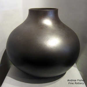 Large black micaceous jar