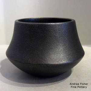 A black micaceous jar