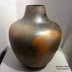 Fire clouds on a golden micaceous jar