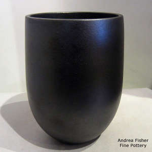 Fire clouds on a plain black micaceous jar