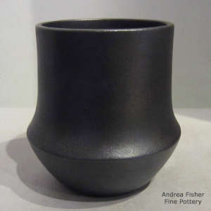 Fire clouds on a plain black micaceous jar