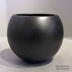 A plain micaceous black jar