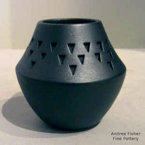 Band of corrugation on a micaceous black jar