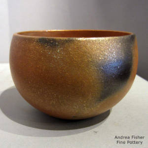 Fire clouds on a golden micaceous jar