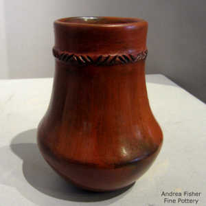 Fire clouds, braided biyo' and pine pitch coating on a brown jar