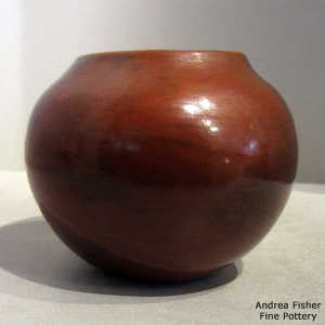 Fire clouds and pine pitch coating on a brown jar