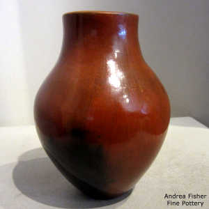 Fire clouds and pine pitch coating on a brown jar