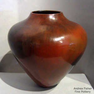 Fire clouds and pine pitch coating on a brown jar