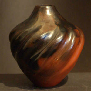 Fire clouds on a swirl brown melon jar