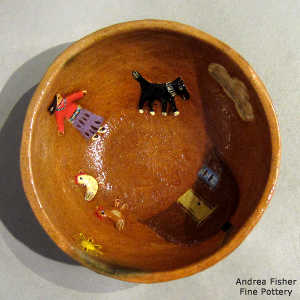 Navajo yard scene inside a polychrome bowl