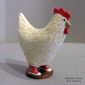 White chicken with red sneakers