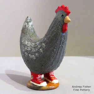 Red sneakers on a grey chicken
