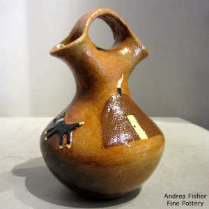 Navajo yard scene on a polychrome wedding vase