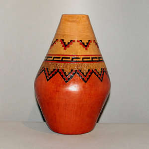 Square opening and Navajo carpet design on a tall brown jar
