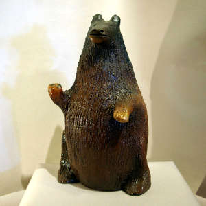 Pine pitch-coated brown bear