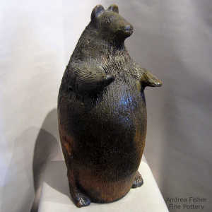 Pine pitch coats this large bear figure