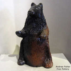 Pine pitch coats this bear coin bank