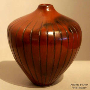 Fire clouds on a Navajo melon jar