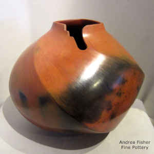 Kiva step cut on a squarish opening on a faceted brown jar