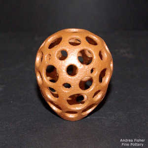 Perforated miniature golden micaceous jar