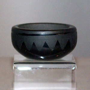 Geometric design on a black on black bowl