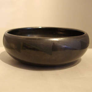 Geometric designs on a black on black bowl