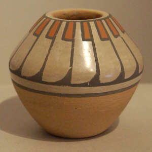 Feather design on a polychrome jar