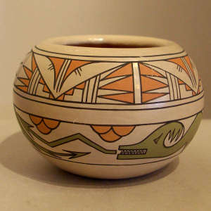 Avanyu, cloud and geometric design on a polychrome jar