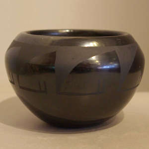 Geometric design on a black on black jar