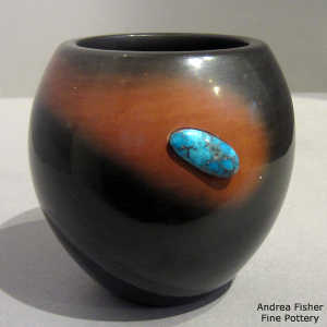 Turquoise inlay in a two-tone black and sienna jar