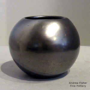 A plain gunmetal black jar