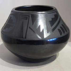 Geometric design on a black on black jar