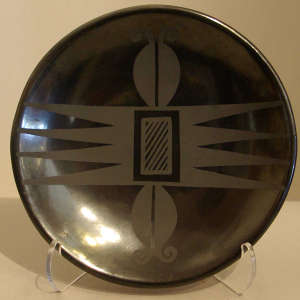 Leaf design on a black on black plate