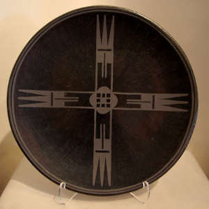 Unique four direction design on a black on black plate