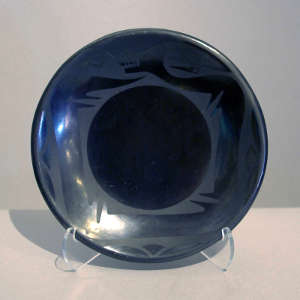 Avanyu design on a black on black plate