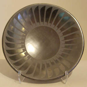 Feather design on a black on black plate