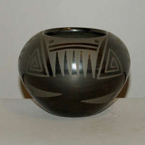 Geometric design on a black on black jar