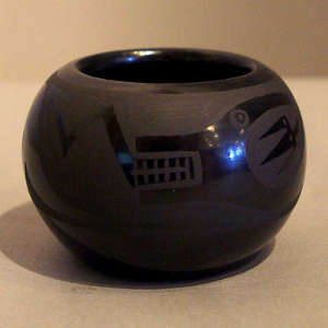 An avanyu design on a black on black bowl